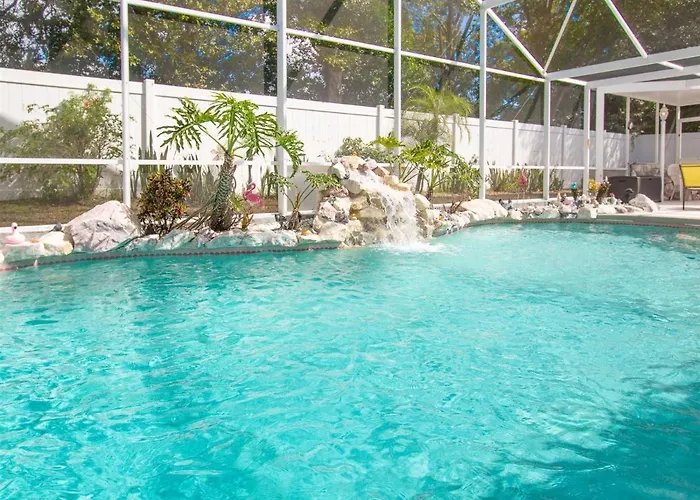 3 Bedroom Home With Private Screened Pool With Rock Waterfall Feature And Gameroom By Florida Dream Homes