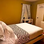 Spotless Guest Room With Shared Bathroom