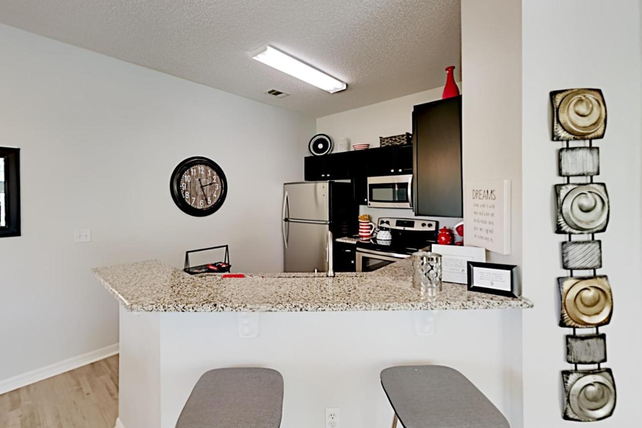 Renovated Emerald Island Gem, Heated Pool & Tennis Townhouse