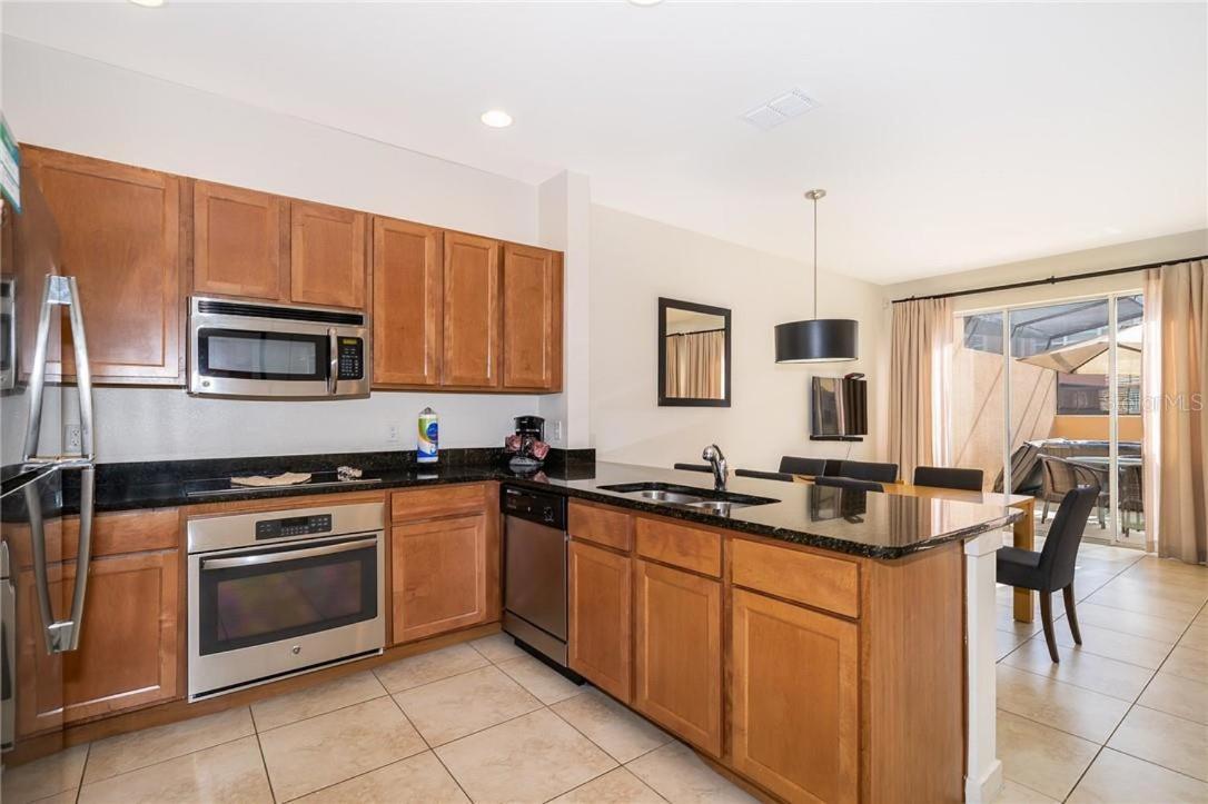Holiday home Charming 3 Bd W/ Spa Close To Disney @ Regal Oaks 2649