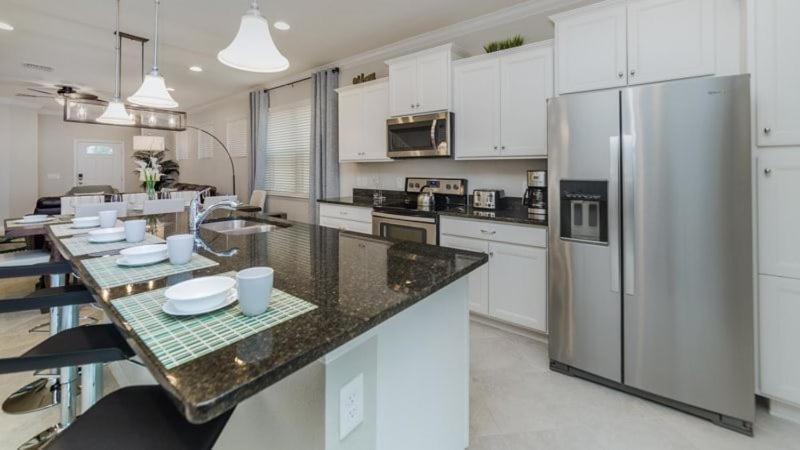 Amazing 5 Bed 5 Bath Pool In Windsor At Westside Holiday home Orlando