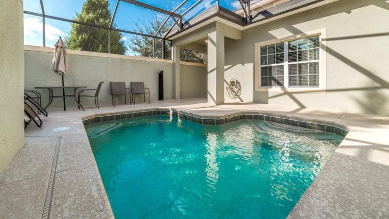 Gorgeous 5 Bed 4 Bath Townhome With Splash Pool In Paradise Palms Holiday home Orlando