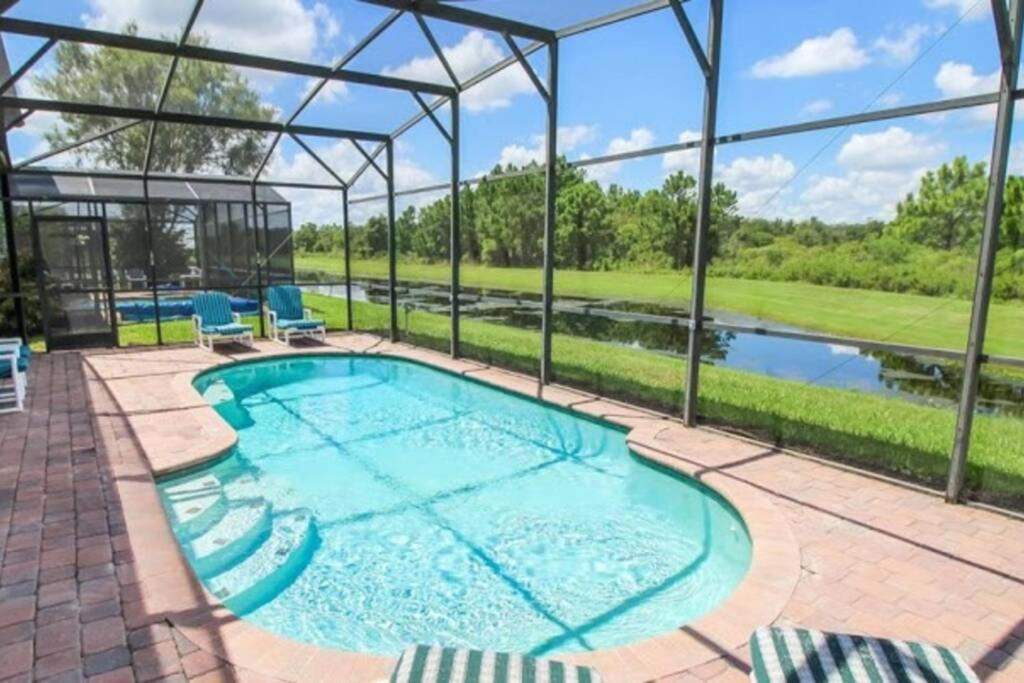 Serene 4-bedroom Lakeview Retreat With South-facing Pool & Sun-drenched Outdoor Living *
