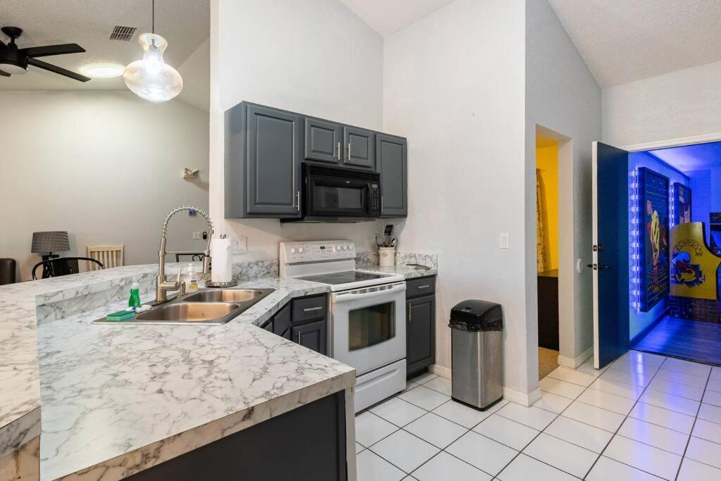 Holiday home 13 Mins From Disney Arcade, Private Pool, & Themed Rooms *
